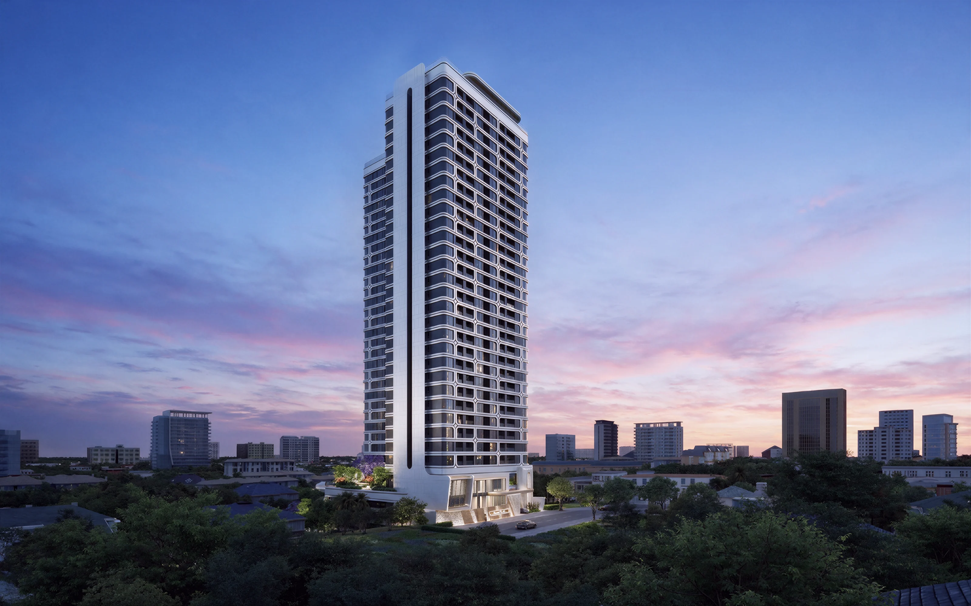 Architectural render of the Coral Cove tower at dusk